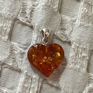 Amber heart with sterling silver